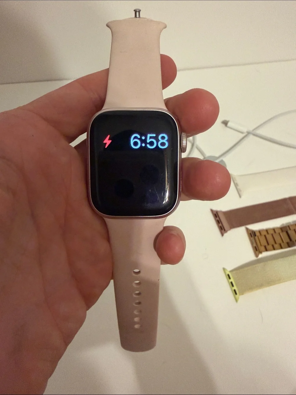 Apple Smartwatch with Light Pink Sport Band, 4 Extra Bands, and charger